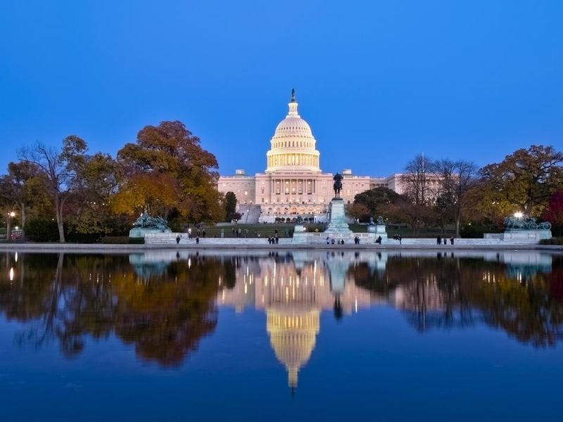 A beautiful reflection of United States Capitol at dawn