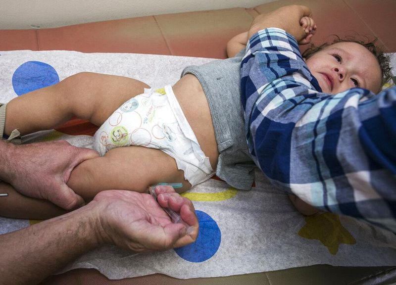 A child getting his MMR vaccine