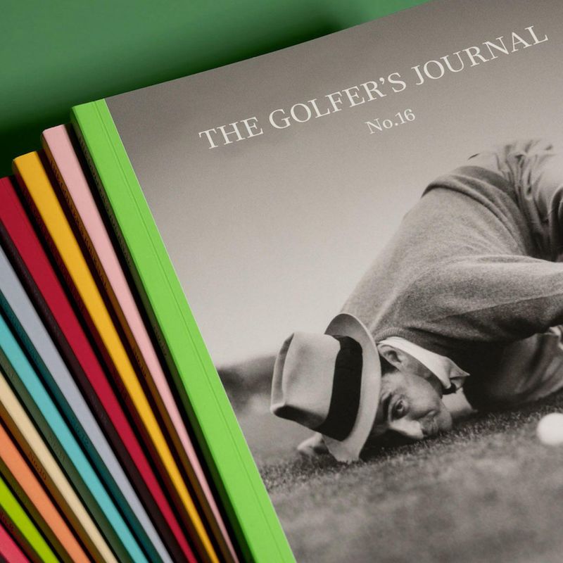 A stack of The Golfer's Journal magazine issues