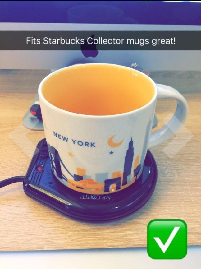 A Starbucks mug on a mug warmer