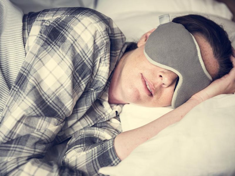 A woman sleeping soundly, hangover headache cure