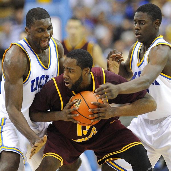 UCLA forward/center Alfred Aboya, of Cameroon, left and UCLA guard Jrue Holiday, right, double team Arizona State guard James Harden during the second half of a NCAA college basketball game, Saturday, Jan. 17, 2009, in Los Angeles. Arizona State won 61-58. (AP Photo/Gus Ruelas)