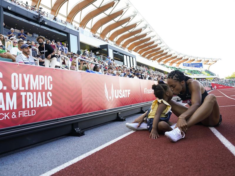 Allyson Felix celebrates after her second place finish