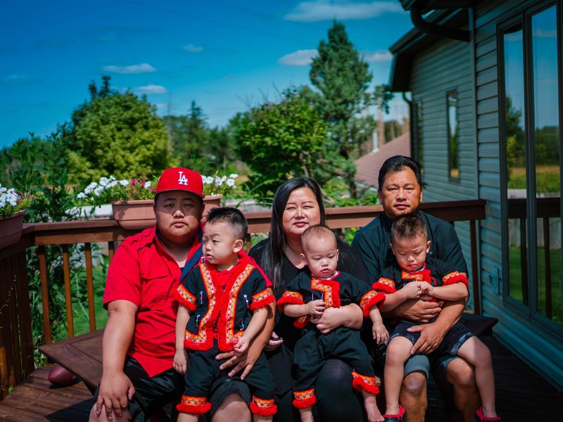 Annie Vang, Hmong translation developer, and her family