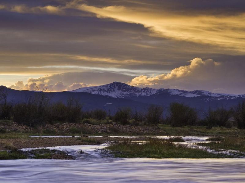 Arkansas River and Mountains at Sunset in Colorado