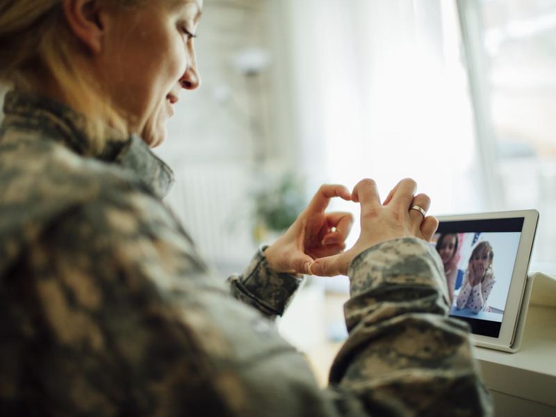 Army mom talking with her children over tablet