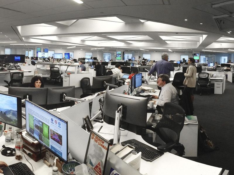 Associated Press journalists in the newsroom at AP headquarters in New York