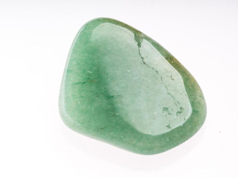 Aventurine (Dongling jade) mineral stone sample with white background