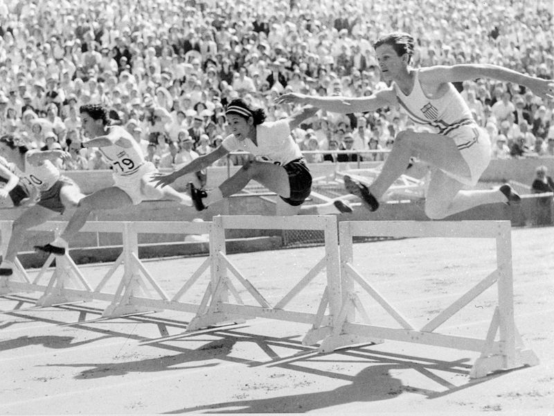 Babe Didrikson clears a hurdle at the 1932 Olympics in Los Angeles