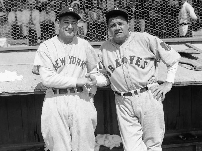 Babe Ruth and Lou Gehrig pose together at a spring training game
