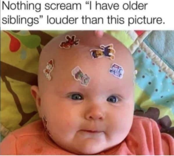 Baby covered in stickers