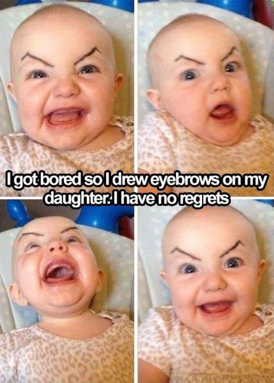 Baby with drawn on eyebrows