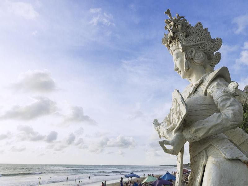 Balinese Sculpture overlooking beach in Bali