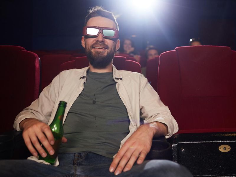 Bearded Man Watching 3D Movie in Cinema