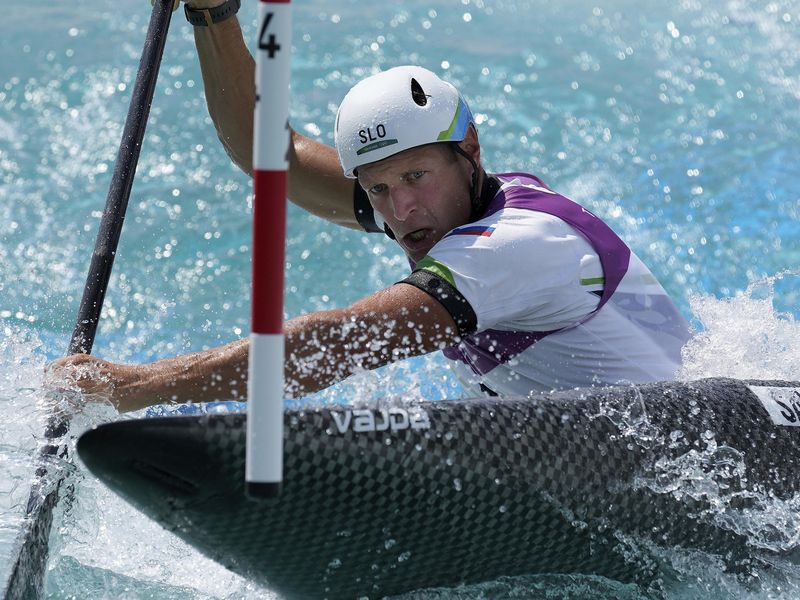 Benjamin Savsek competes in canoe slalom