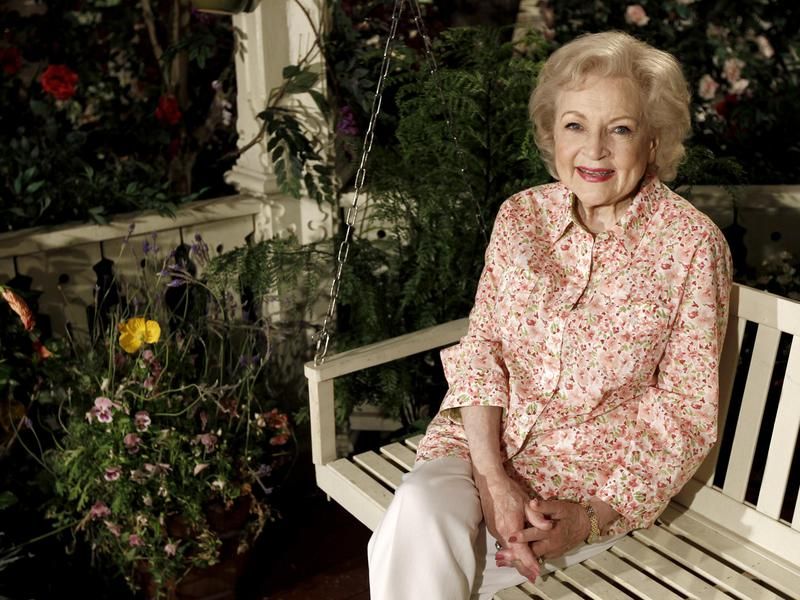 Betty White relaxing on a chair