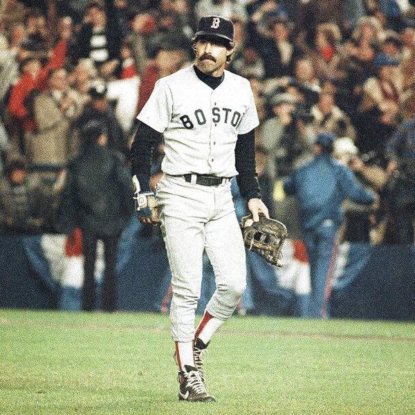 Boston Red Sox first baseman Bill Buckner is a picture of dejection as he leaves the field after committing an error on a ball hit by New York Mets Mookie Wilson which allowed the winning run to score in the sixth game of the World Series, Saturday night, Oct. 25, 1986 in New York.  (AP Photo/Rusty Kennedy)