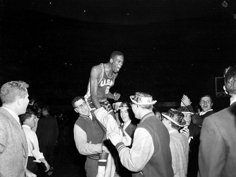 Bill Russell is carried from floor of Kansas City's Auditorium