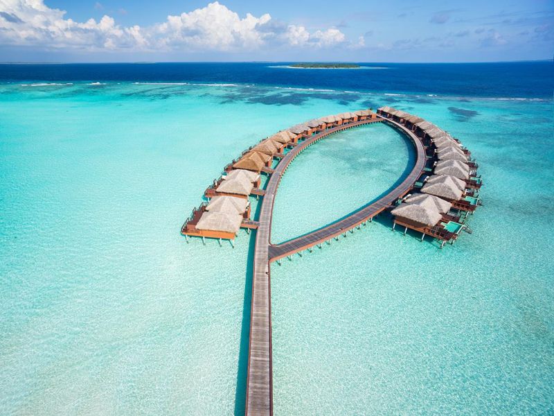 Bird's-eye view of luxury overwater villas in Maldives