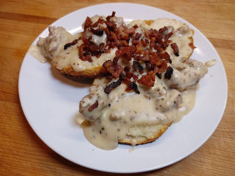 Biscuits and gravy with bacon