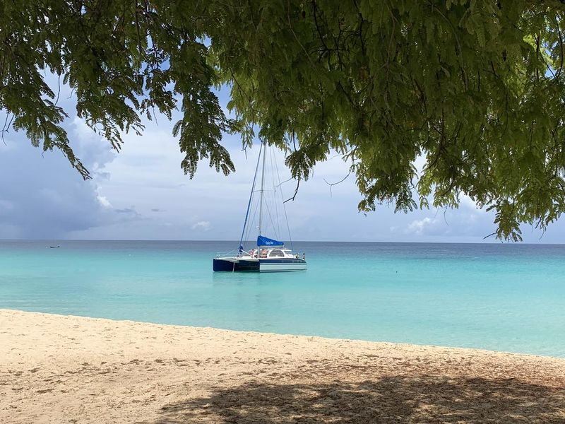Boat anchored off of Meads Bay beach on the Caribbean island of Anguilla