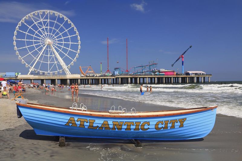 Boat lifeguard, beach and steel Pier in Atlantic City, New Jersey