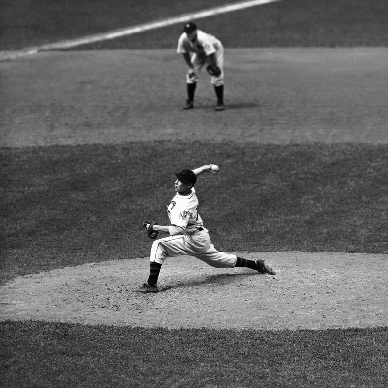 Bob Feller delivering to the plate