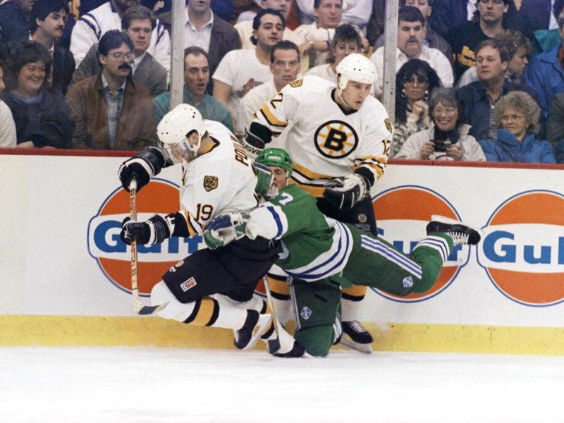 Boston Bruins battle the Hartford Whalers