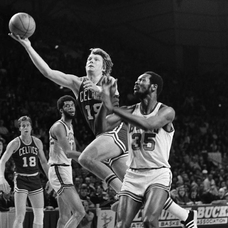 Boston Celtics' Don Nelson takes off