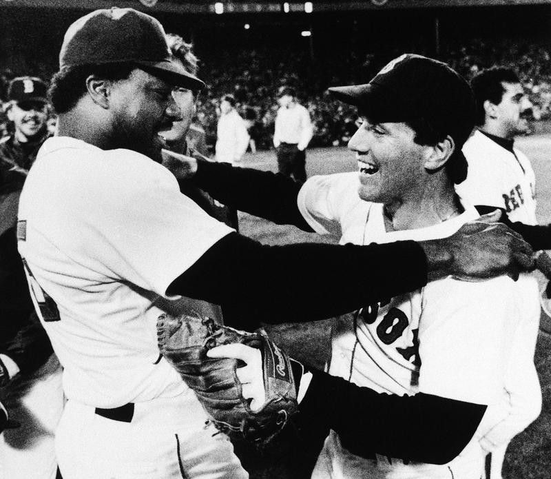 Boston Red Sox designated hitter Don Baylor celebrates with second baseman Marty Barrett