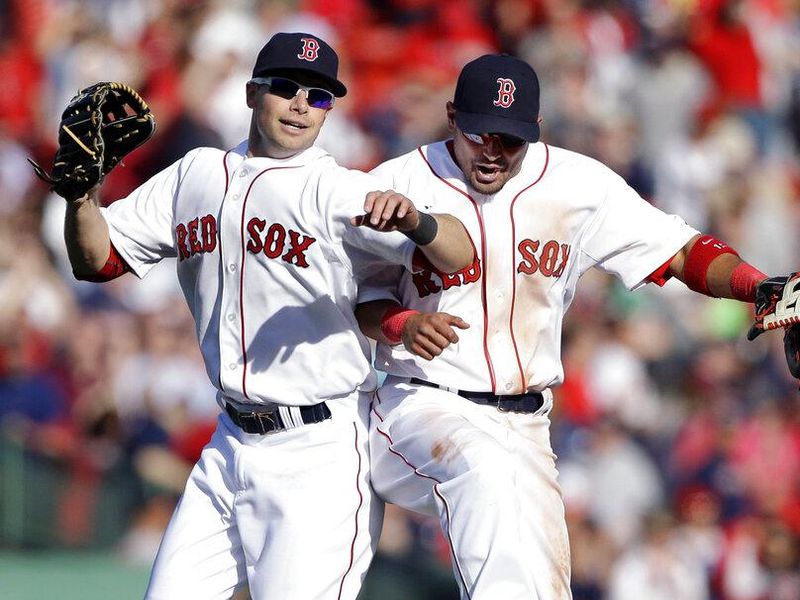 Boston Red Sox left fielder Daniel Nava, left, and right fielder Shane Victorino