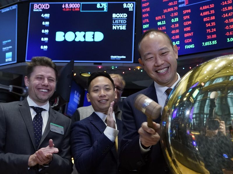 Boxed CEO Chieh Huang rings ceremonial bell on the floor of the New York Stock Exchange