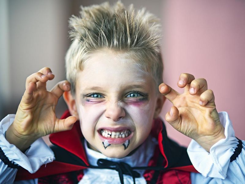 Boy dressed up as Halloween vampire