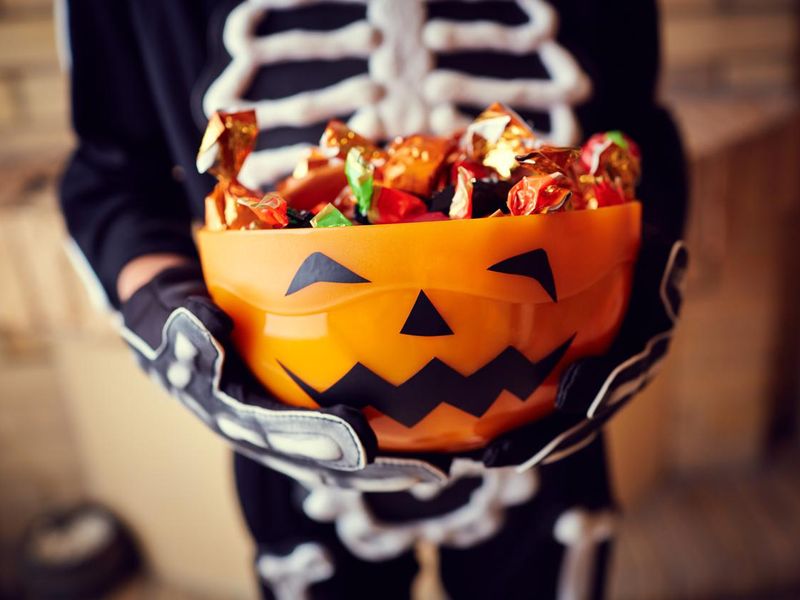 Boy holding halloween candy