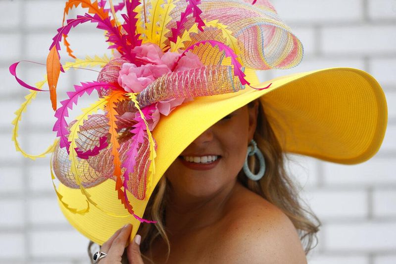 Bright yellow hat at the Kentucky Derby