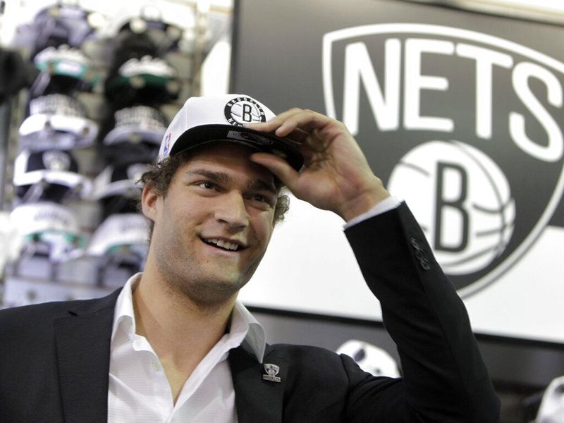 Brook Lopez with nets logo hat