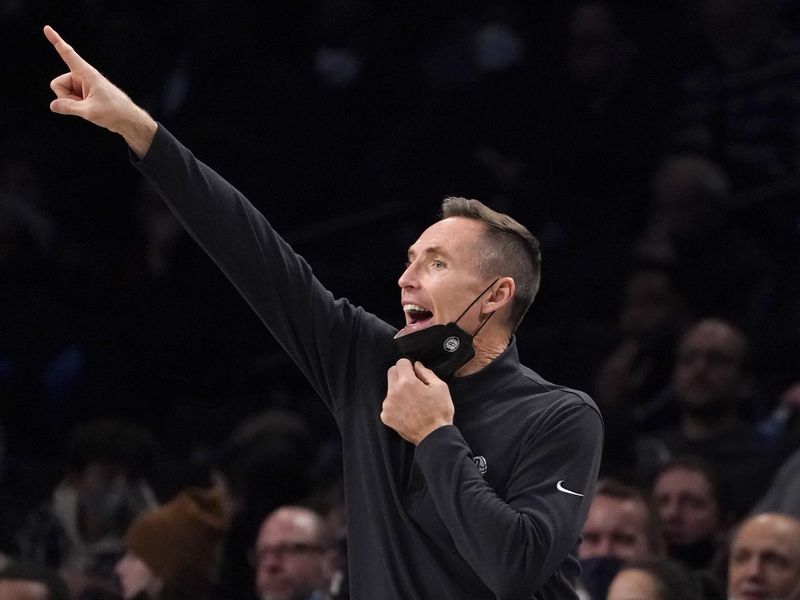 Brooklyn Nets head coach Steve Nash directs players from bench