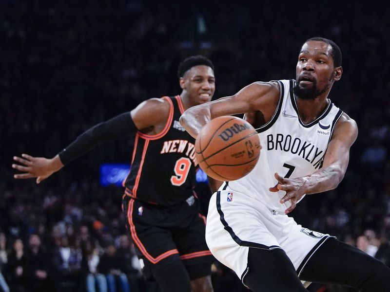 Brooklyn Nets' Kevin Durant passes ball away from New York Knicks' RJ Barret