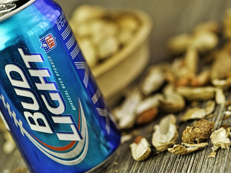 Bud Light can and peanuts
