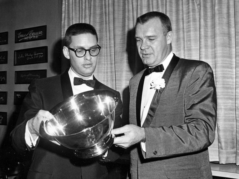 Bud Selig and Richard H. O'Connell admire a trophy