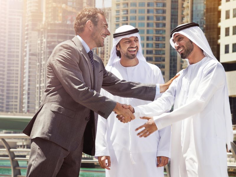 Businessmen making a deal in Dubai