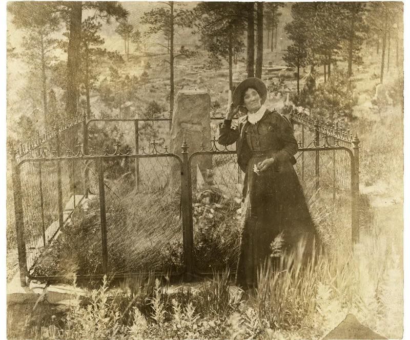 Calamity Jane at Wild Bill Hickok's grave
