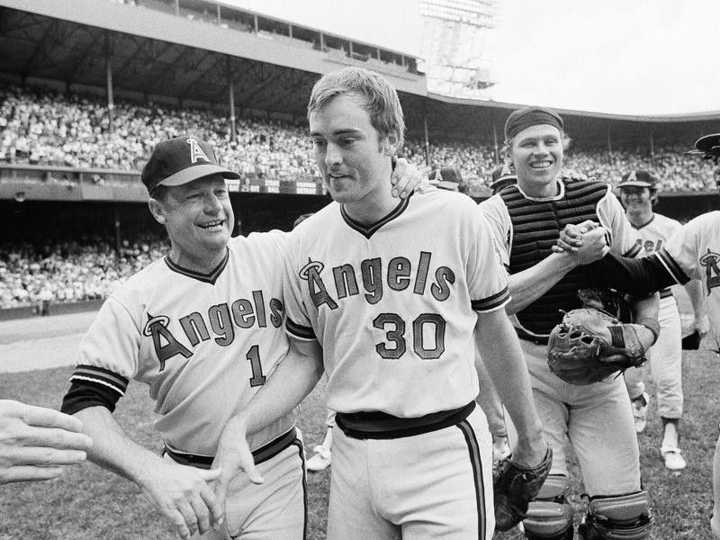 California Angels pitcher Nolan Ryan congratulated by Bobby Winkles