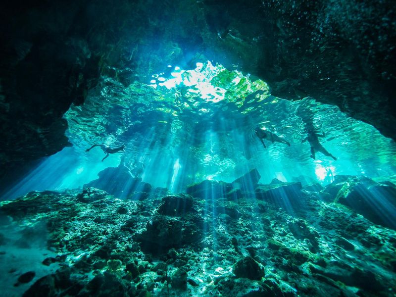 Cenote snorkeling, underwater cave in Mexico