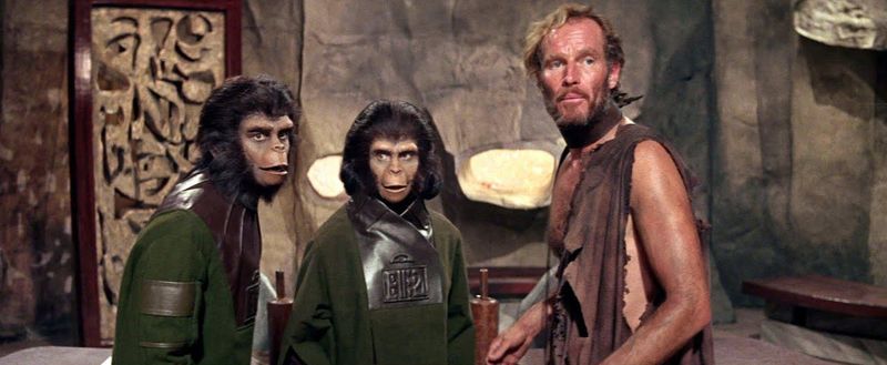 Charlton Heston and apes in Planet of the Apes