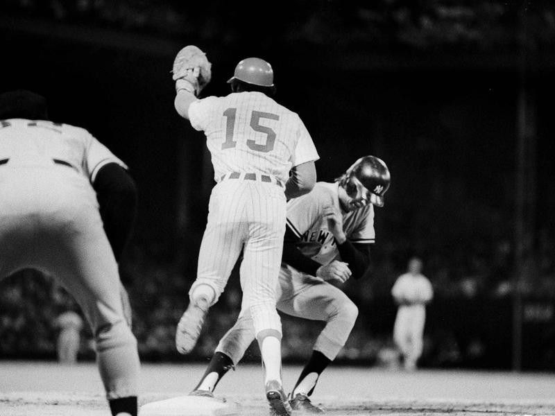 Chicago White Sox first baseman Dick Allen catches a high throw