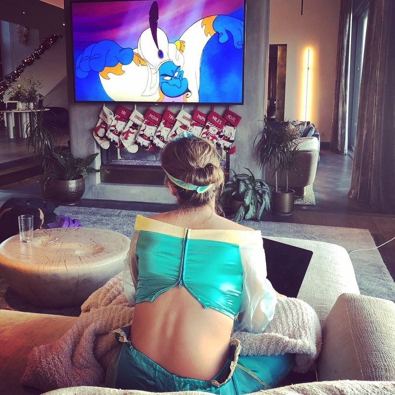 Chrissy Teigen watching "Aladdin"