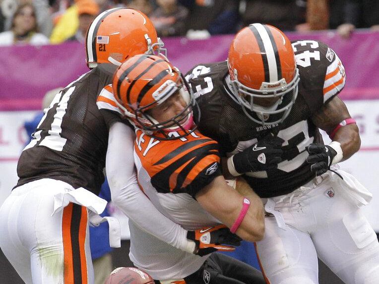Cleveland Browns safety T.J. Ward (No. 43) hits a Bengals player