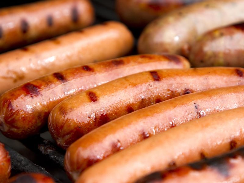 Close up of grilled hotdogs on grill