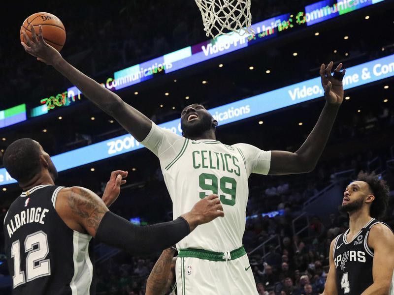 ColorBoston Celtics center Tacko Fall grabs rebound